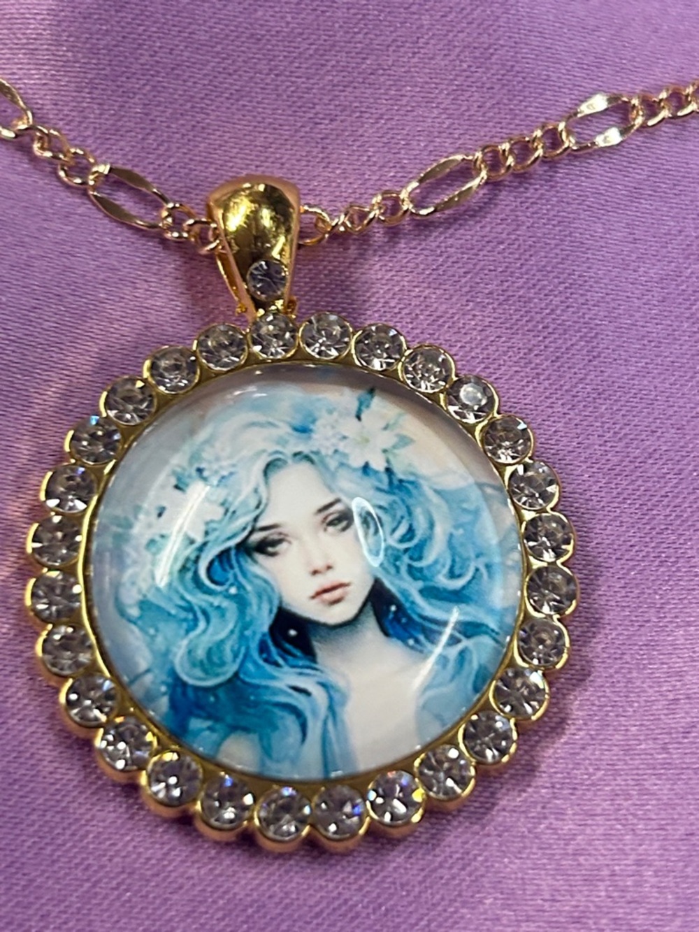 Gold Crystal-Trim 1 inch Pendant Necklace with Blue Art Portrait